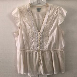 White shirt sleeve button up blouse.